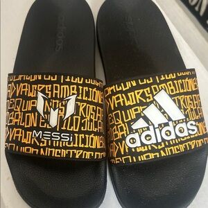 Adidas Black Slides with Gold and White Accents
